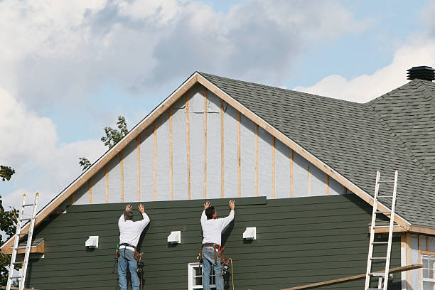 Professional Siding technician working in Dorchester, MA
